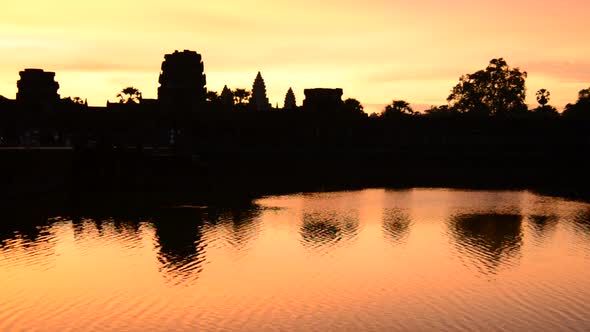Silhouette Main Temple Buildings Lake Reflection At Sunrise - Angkor Wat