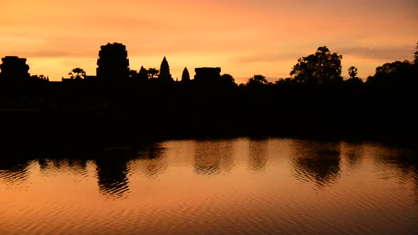 Silhouette Of The Main Temple Buildings With Lake Reflection At Sunrise - Angkor Wat, Cambodia 2