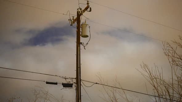 Time Lapse Of Telephone / Power Pole At Night