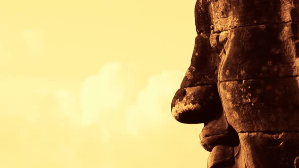 Zoom Out Of Stone Carving Of Buddha's Face On Temple Wall - Angkor Wat Temple Cambodia 1