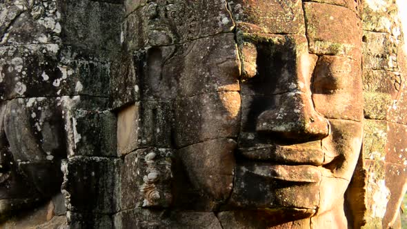 Zoom Out Of Stone Statue Of Buddha  - Angkor Wat, Cambodia 2