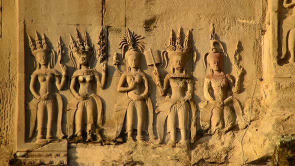 Stone Carving Of Religious Icons On Temple Wall - Angkor Wat, Cambodia 3