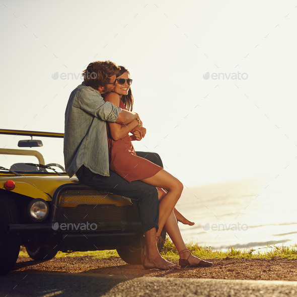 Romantic young couple on road trip - Stock Photo - Images