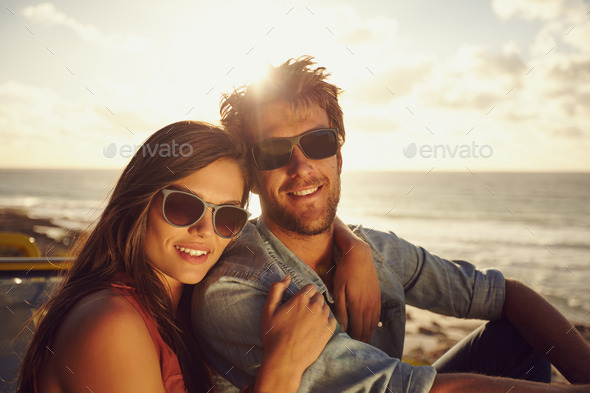 Beautiful young couple on a road trip - Stock Photo - Images