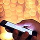 Man with a Touchscreen Phone on a Bokeh Background Man with a Touchscreen Phone on a Bokeh Background - VideoHive Item for Sale