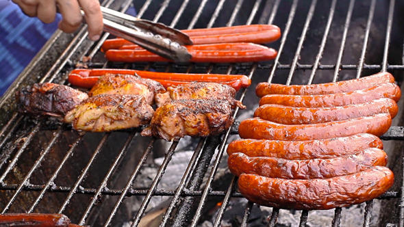Grilling Meat at Outdoor Festival alt