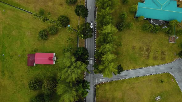 Cinematic Drone Footage of Palm Oil Mill Effluent residential consists of buildings, homes, main roa alt