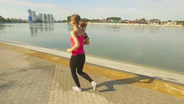 Runner Woman Running In City Exercising Outdoors 9 alt