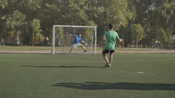 Soccer Team Celebrating Win After Penalty Shootout alt