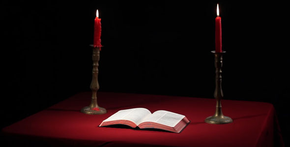 Open Bible With Candles