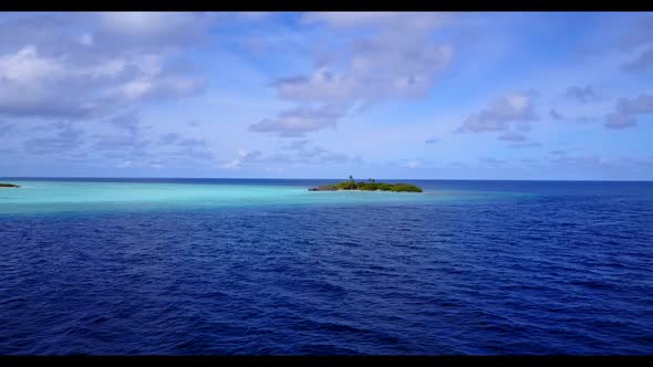 Aerial drone seascape of marine island beach lifestyle by aqua blue lagoon with clean sandy backgrou alt
