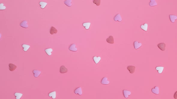 Rotating Background of Hearts on a Pink Background