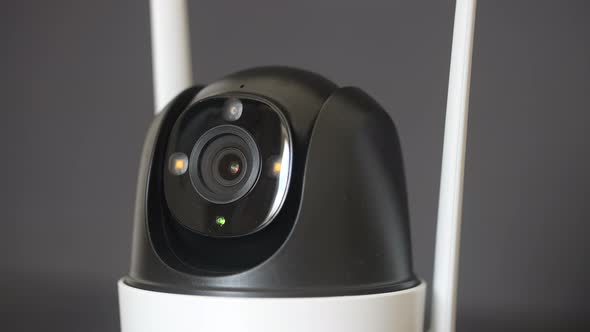 Close-up home security camera on background. CCTV security camera alt