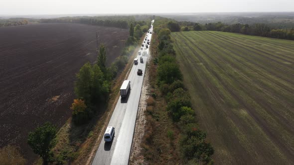 Traffic Motion Aerial Panorama View. Road Rollers Building the New Asphalt Road alt