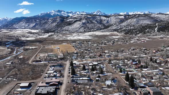 Flyover Scenic Cityscape Of Snowy Mountain Village Ridgway Colorado Usa alt