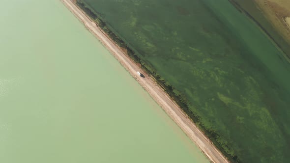 The lake with a path in the middle alt