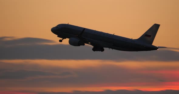 Aeroflot plane taking off in late evening alt