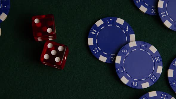 Rotating shot of poker cards and poker chips on a green felt surface - POKER 022 alt