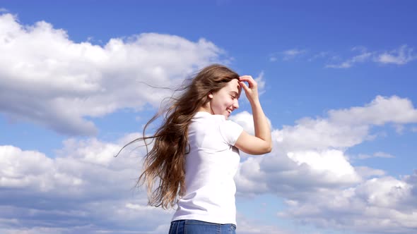 Happy Child Has Long Beautiful Hair Enjoy the Sun on Sky Background Childhood alt