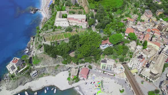 Panorama view of Monterosso al Mare.Panoramic drone view of railway and village.Unesco Heritage.4K alt