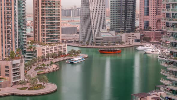 Waterfront Promenade in Dubai Marina Aerial Timelapse alt