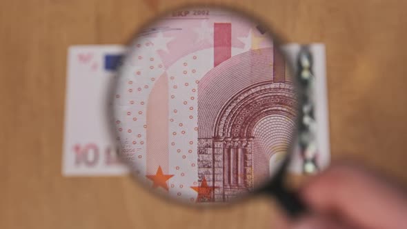10 Euro Under Magnifying Glass alt