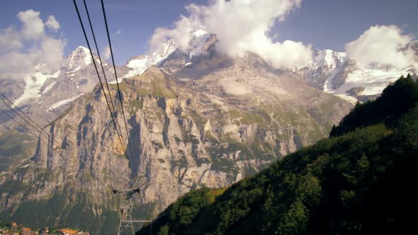 Tracking shot of the Alps in Switzerland alt