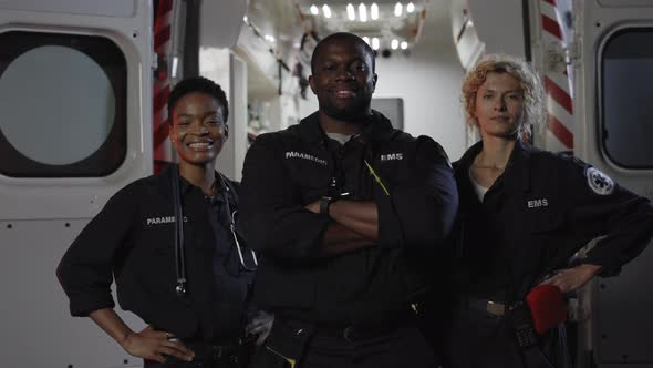 Team of Ems Paramedics in Uniform Posing Near Ambulance, Stock Footage