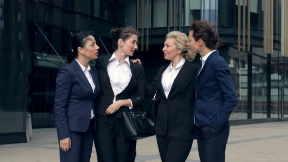 Excited Middle-aged Business Women in Suit Friendly Team Embrace Bonding Laugh, Friends at Work