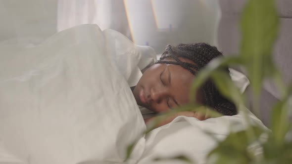 Young Black Woman Sleeping alt