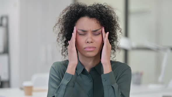 African Woman Having Headache alt