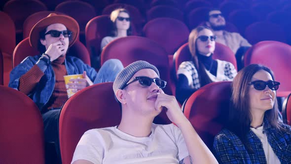 Rude Man Puts His Feet Up and Throws Popcorn at the Movie Theater ...