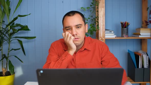 Young Man Feels Pressure of Work or Education alt