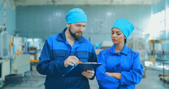 Workers at the Factory of Household Chemicals the Production of Liquid Soap Going Through the alt