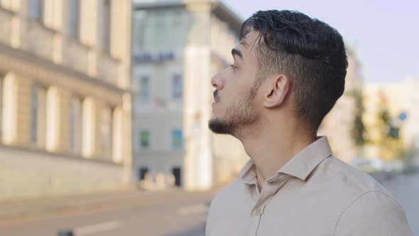 Portrait of Pensive Dreamy Contemplating Arabic Indian Hispanic Business Man Bearded Guy Male alt