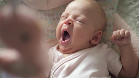  - A Slow Motion of a Yawning Baby Girl alt