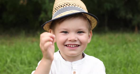 Handsome Little Caucasian Boy Pulling Funny Faces