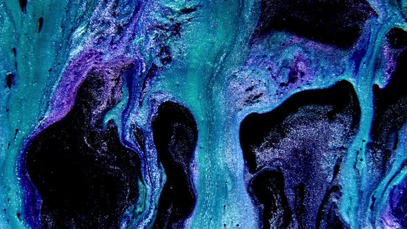 Abstract Paint Mixing Neon Blue Green and Violet Purple Colors Ink