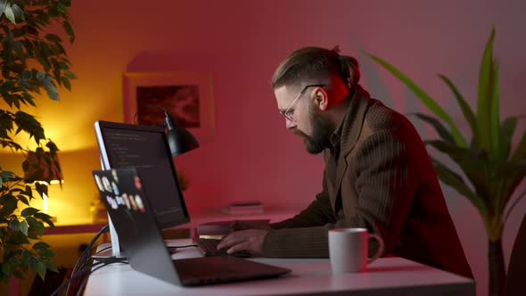 Man Coding on Computers