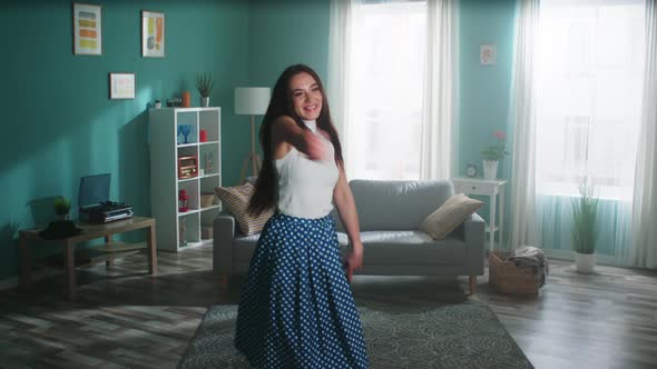 Active Woman Is Dancing at Home