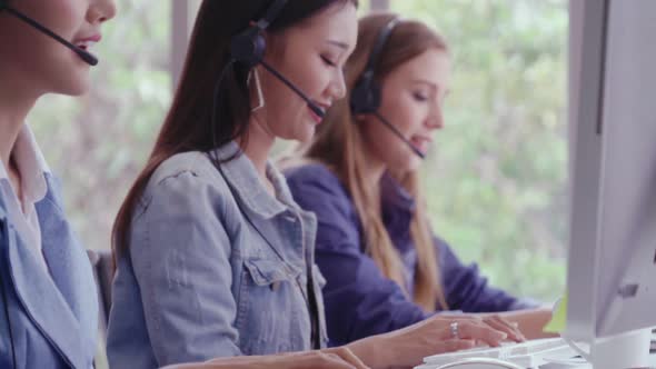 Customer Support Agent or Call Center with Headset Talking to Customer on Phone alt