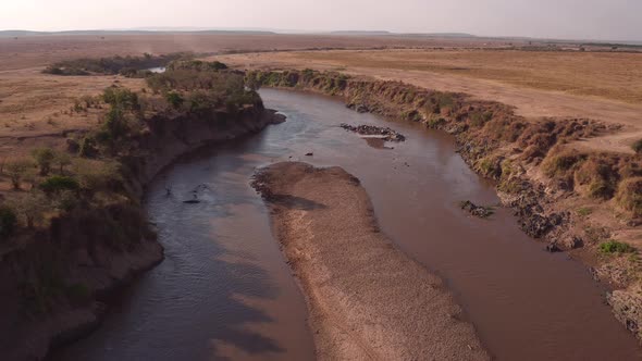 Aerial of Mara river in the African savannah alt