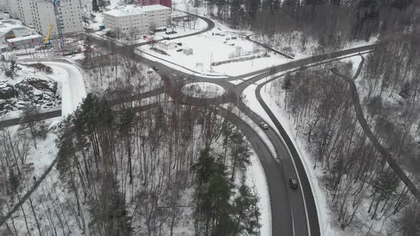 Roads Leading Up to Roundabout Winter Traffic Scene Aerial