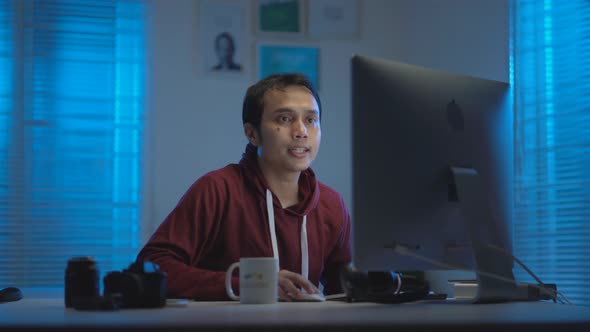 Asian man working from home at night_105 alt