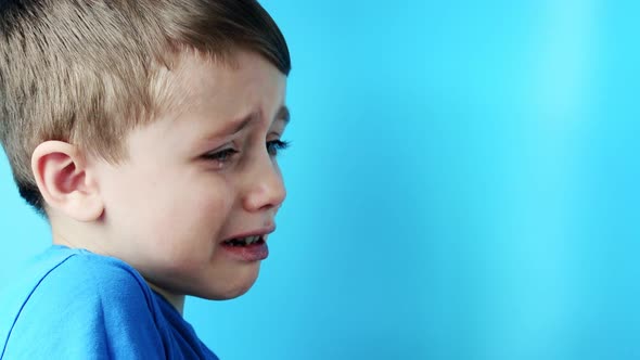 Emotional Tantrum and Angry little boy at home.Depressed toddler complaining alt