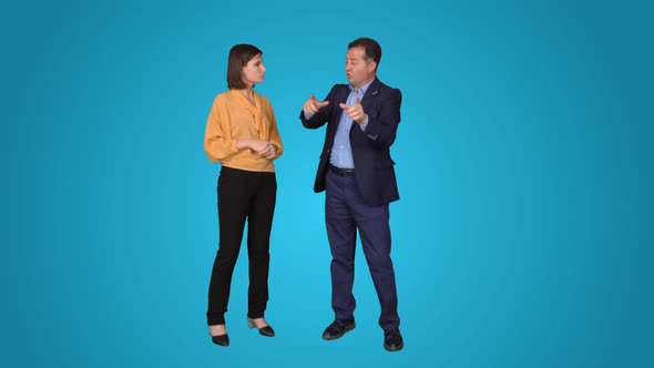 Man and woman working on architectural project. alt