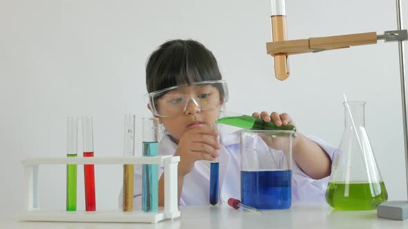 Children play and learn chemical in laboratory