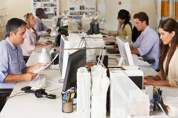 Team Working At Desks In Busy Office - Stock Photo - Images