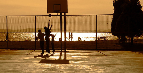 Playing Basketball at Sunset