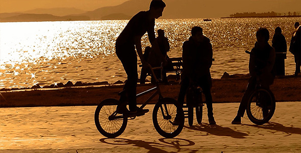 Friends with Bicycles at Sunset